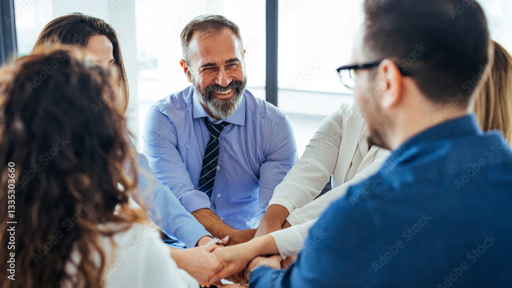 Fototapeta premium Team Members Collaborating in an Office During a Group Meeting for Business Success
