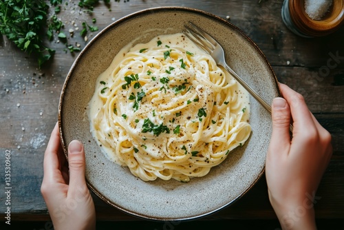 Homemade Fettuccine Alfredo Served in a Rustic Bowl With Fresh Herbs