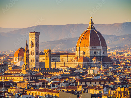 Stunning view of the Cathedral of Saint Mary of the Flower with Brunelleschi's Dome, the nave and Giotto's bell tower as seen from Michelangelo Hill, Florence, Italy