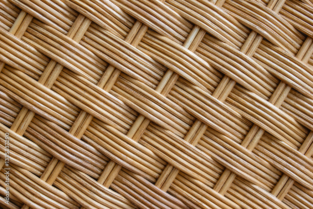 Diagonal texture of rattan furniture close-up. Abstract wooden background. Selective focus Diagonal texture of rattan furniture close-up. Abstract wooden background. Selective focus