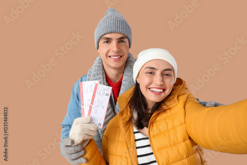 Cute young couple in warm c...