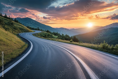 Wallpaper Mural Scenic sunset over winding mountain road with blurred car motion in a serene summer landscape Torontodigital.ca