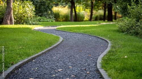 Wallpaper Mural Curved gravel pathway winding through a lush green park during late afternoon Torontodigital.ca