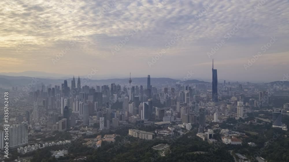 A panoramic view of Kuala Lumpur, showcasing the city's impressive density and architectural diversity. A panoramic view of Kuala Lumpur, showcasing the city's impressive density and architectural diversity.