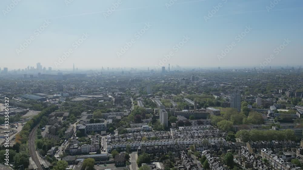A bird’s eye view of London cityscape in haze. A bird’s eye view of London cityscape in haze.