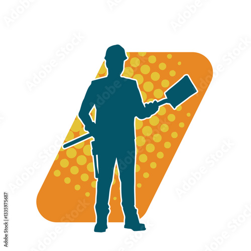 Silhouette of a worker carrying shovel tool. Silhouette of a worker in action pose using shovel tool.