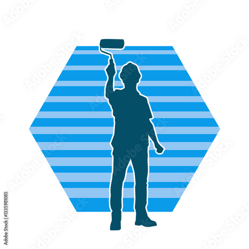 Silhouette of a male worker doing painting work. Silhouette of an interior painter worker.