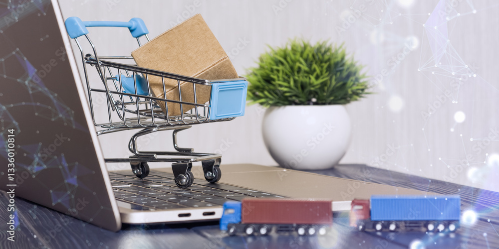 Mini shopping cart with a package on a laptop keyboard, symbolizing e-commerce, online shopping, and digital retail with logistics.
