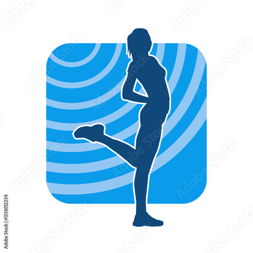 Silhouette of slim female doing exercise. Silhouette of a sporty woman doing gym workout pose. 