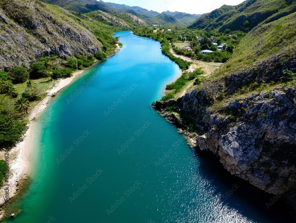 Turquoise River Between Mountains and Lush Vegetation Under a Clear Sky Awaits Exploration Turquoise River Between Mountains and Lush Vegetation Under a Clear Sky Awaits Exploration