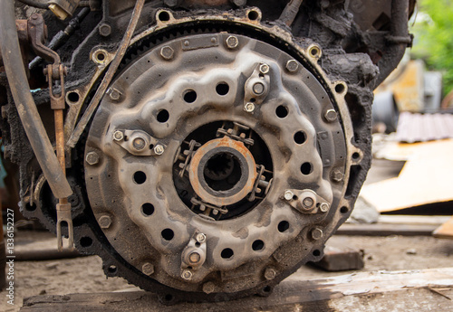 a mechanism that connects the engine to the transmission and allows them to be temporarily disconnected when shifting gears