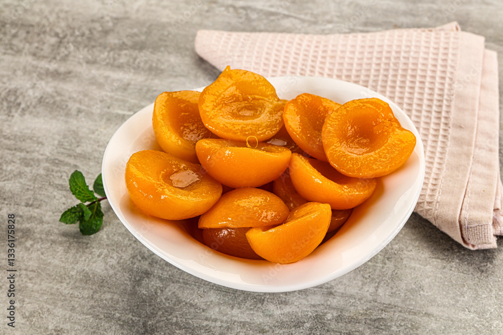 Sweet canned apricots with syrope Sweet canned apricots with syrope