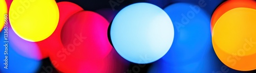 A colorful display of blurry lights with a dark background