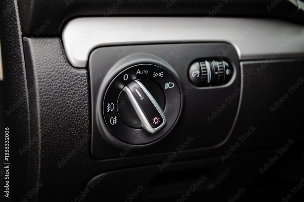 close up of a car headlights control close up of a car headlights control