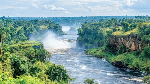 Breathtaking Murchison Falls National Park, Uganda: A Panoramic View of the Mighty Nile River Cascading Through Lush Green Cliffs and Foamy Rapids.