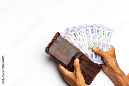 Close-up of Counting Indian rupee isolated on white background 