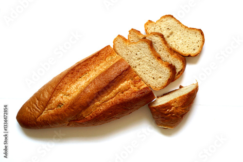 French bread sliced on white background, a baguette is a long, thin type of bread of French origin