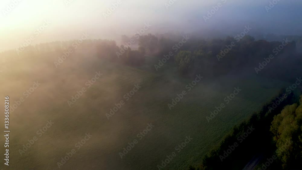 Scenic Aerial View of Village Foggy Morning in Poland. Amazing Nature Landscape Wonderful Morning Sunrise. Epic Fog Amazing Nature Landscape. Hills Fields Trees Forest Agriculture Field. Scenic Aerial View of Village Foggy Morning in Poland. Amazing Nature Landscape Wonderful Morning Sunrise. Epic Fog Amazing Nature Landscape. Hills Fields Trees Forest Agriculture Field.