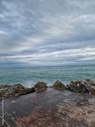 Tranquil Coastal Waves Against Rocky Shore