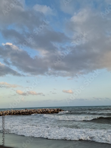 Tranquil Coastal Waves Against Rocky Shore