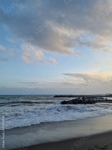 Tranquil Coastal Waves Against Rocky Shore