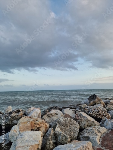 Tranquil Coastal Waves Against Rocky Shore