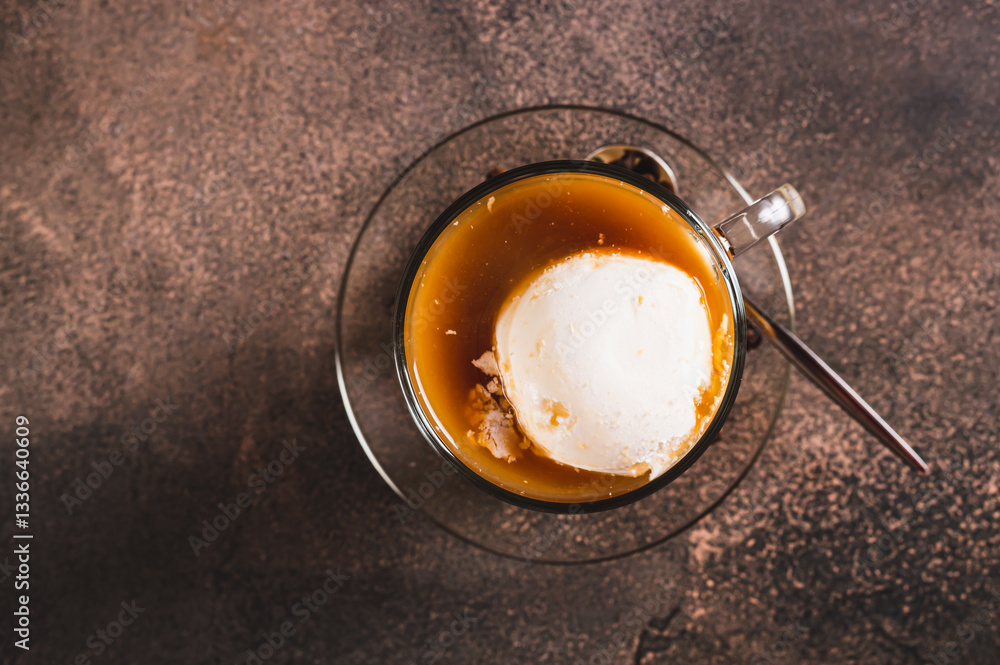 Close up of delicious sweet affogato coffee with creamy ice cream in a cup on the table top view