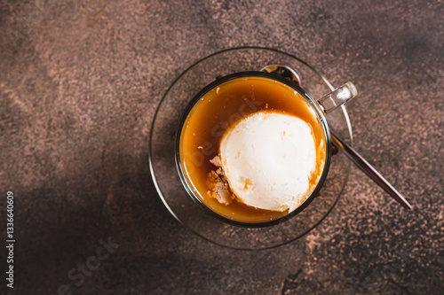Obraz na płótnie Close up of delicious sweet affogato coffee with creamy ice cream in a cup on the table top view w salonie