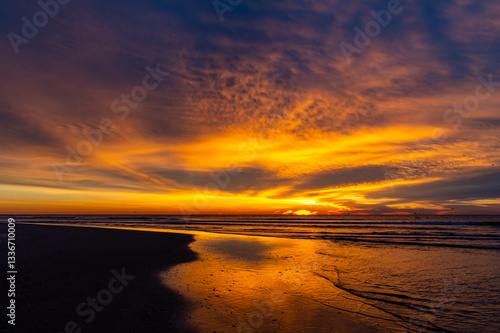 Orange Cloudy Sunrise on Beach 1