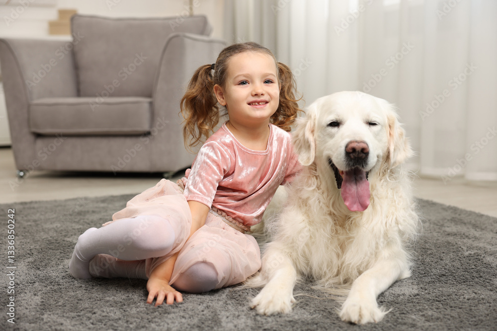 Little girl with cute dog on carpet at home Little girl with cute dog on carpet at home