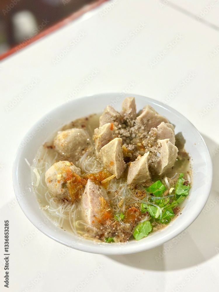 Bakso Urat with sambal – not the most popular choice during Ramadan, but a sought-after alternative for those craving a break from rich coconut-based dishes. Cisauk, Indonesia - March 2, 2025. Bakso Urat with sambal – not the most popular choice during Ramadan, but a sought-after alternative for those craving a break from rich coconut-based dishes. Cisauk, Indonesia - March 2, 2025.