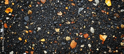 Obraz na płótnie Dark pebbles, orange accents, wet texture w salonie