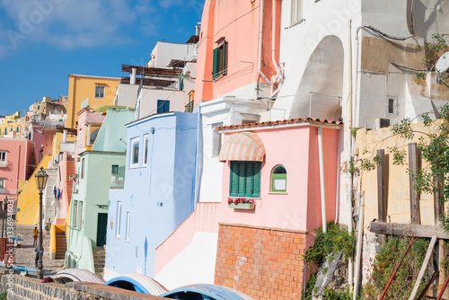 Fototapeta Naklejka Na Ścianę i Meble -   view of the narrow streets of old colorful houses in the center of the Italy Naples, Procida island