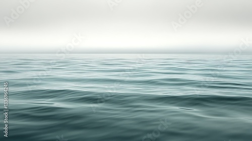 Calm ocean, misty day, tranquil waterscape