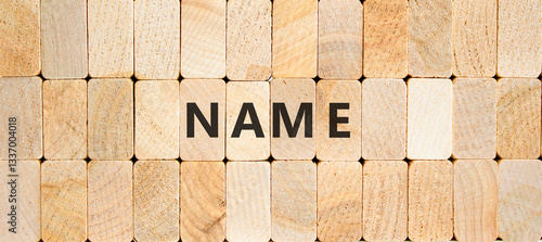 Name symbol. Concept word Name on beautiful wooden blocks. Beautiful wooden blocks background. Business, lifestyle, support and name concept. Copy space.