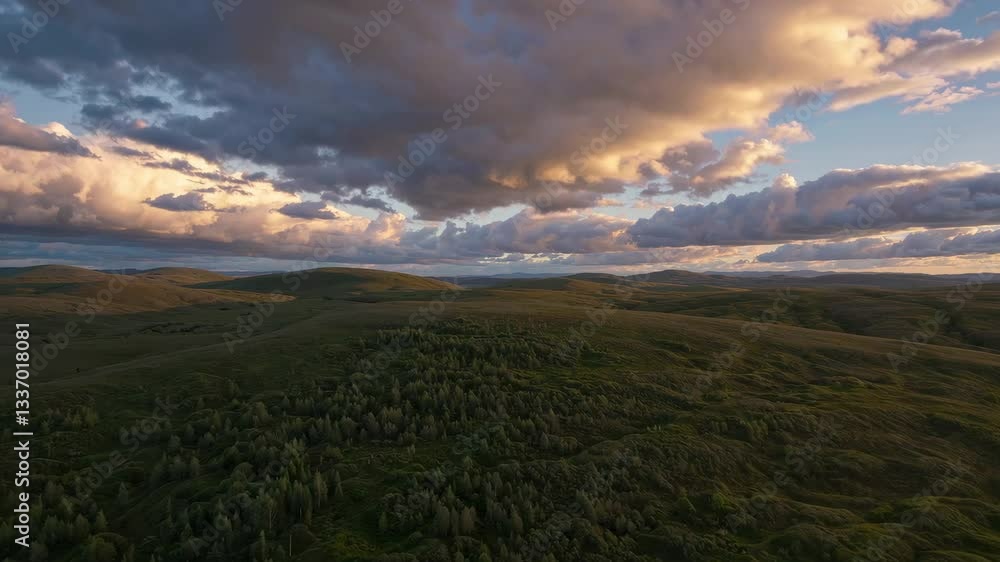 Beautiful landscape features rolling hills and dramatic clouds in golden hour Beautiful landscape features rolling hills and dramatic clouds in golden hour