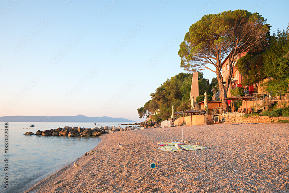 gravel beach at Moscenicka Draga in the early morning. croatian coast