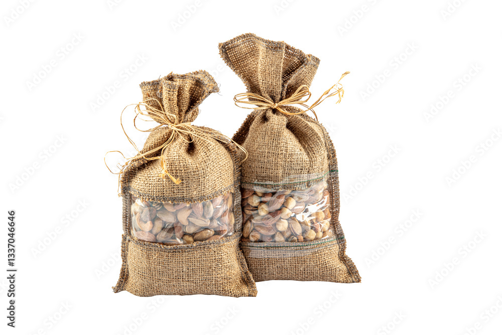 roasted salty pistachios nuts in sack bag, isolated on white background. Salted and Roasted Pistachios in a Bowl. roasted salty pistachios nuts in sack bag, isolated on white background. Salted and Roasted Pistachios in a Bowl.