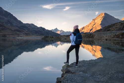 Young woman hiker with back...