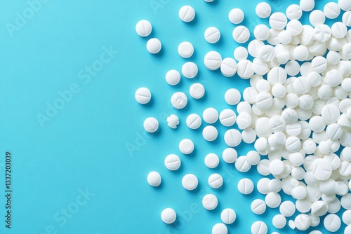 Obraz na płótnie Scattered White Pills On Blue Background With Copy Space w salonie