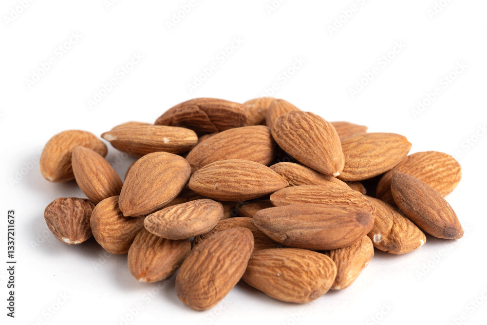 Almond nuts isolated on white background closeup. Healthy food. Almond nuts isolated on white background closeup. Healthy food.