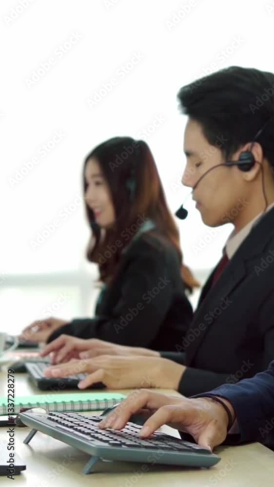 Business people wearing headset working in office to support remote customer or colleague. Call center, telemarketing, customer support agent provide service on telephone video conference call. Business people wearing headset working in office to support remote customer or colleague. Call center, telemarketing, customer support agent provide service on telephone video conference call.