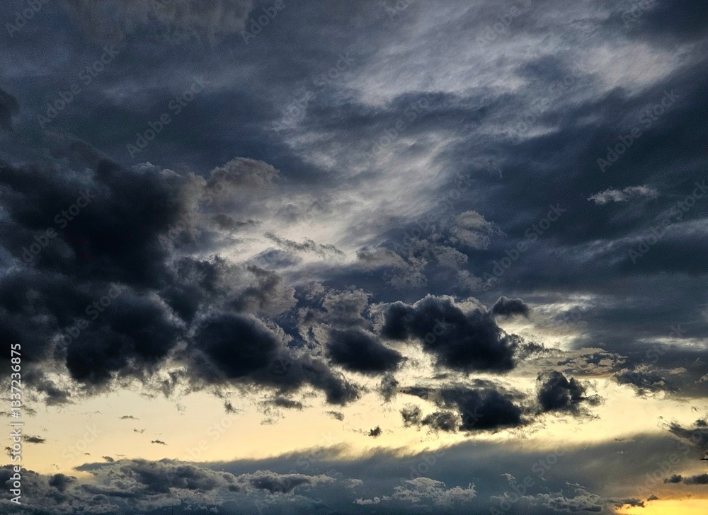 Beautiful sky with clouds background. Sky with clouds weather nature cloud blue. Сloud and sky in the evening. dark clouds in the sky, layers of cloud passing through Beautiful sky with clouds background. Sky with clouds weather nature cloud blue. Сloud and sky in the evening. dark clouds in the sky, layers of cloud passing through
