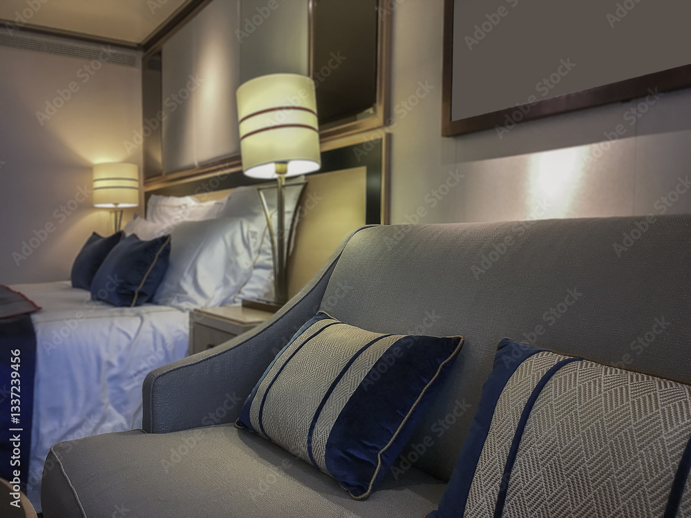 Luxurious balcony or veranda patio cabin stateroom on luxury ocean liner cruiseship or cruise ship in modern Art Deco interior design
