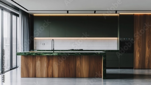 A sophisticated kitchen with a walnut wood island and a rich, dark green marble top