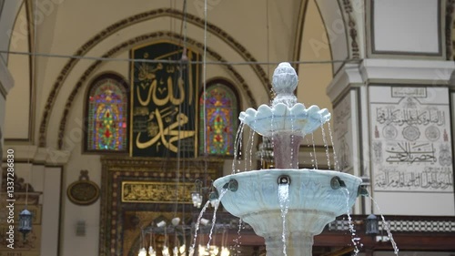 water flowing from mosque fountain