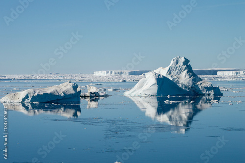 icebergs reflection on the water