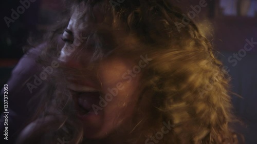 psychotic young woman  (possibly possessed) raging and screaming
