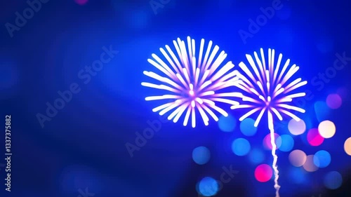 Vibrant Display of Blue Fireworks Lights Up Night Sky, Creating Festive and Celebratory Atmosphere with Colorful Bokeh Effects and Bursts in Background, Adding Depth and Excitement