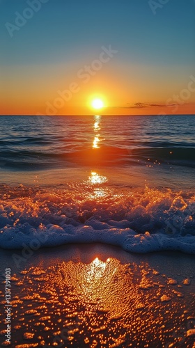 Beautiful Sunset Over Calm Ocean With Gentle Waves Reflecting Golden Light